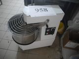 a machine that is sitting on the floor with a price tag on it