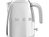 a close up of a silver kettle on a white background