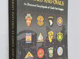 the book cover of u s army patches, flashes and ovals an illustrated encyclopedia of china ' s military insignias