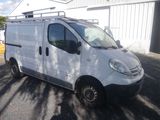 a white van that is parked in a parking lot