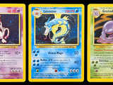 three different pokemon cards are shown in a row on a black background