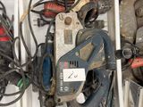 a box full of tools that are sitting on the floor
