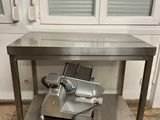 a metal table with a knife on top of it
