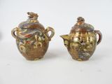 pair of antique japanese vases with dragon handles and lids