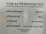 a picture of a sign on the side of a building that says caracteristiques