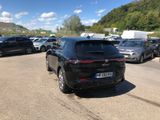a lot of cars that are parked in the parking lot