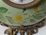 a clock that is sitting on top of a table