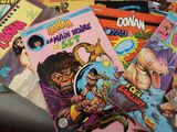 a lot of comic books on the table
