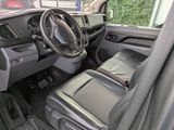 a view of the inside of a vehicle from the driver ' s seat