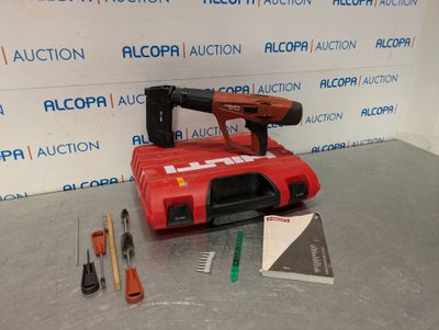 a picture of a red tool box with tools on it