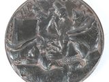 une pièce d'argent sur laquelle figure l'effigie d'un homme à cheval