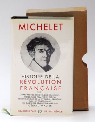 an old book with a picture of a man in a black and white photo