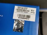 a close up of a blue box with a barcode on it