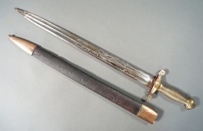 two different types of knives on a table