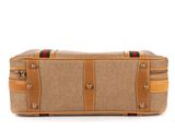 a brown and tan suitcase sitting on top of a white surface