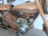 a motorcycle that is parked in a garage