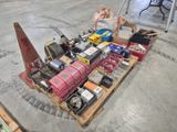 a pile of assorted items sitting on a pallet