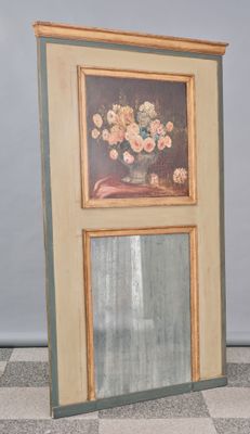 une photo d'une photo représentant un vase de fleurs posé sur un miroir