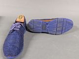 a pair of shoes that are on the floor