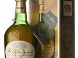 an image of a bottle of whisky sitting in front of a box