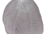 a white glass vase with a leaf pattern on it