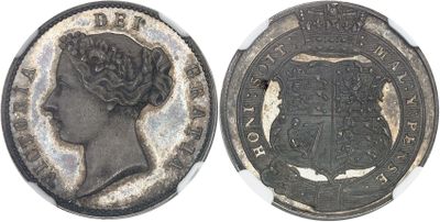 a close up of a coin with a woman ' s head on it