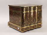 a gold and black box with ornate designs on it