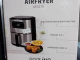 a box of air fryer sitting on a shelf in a store