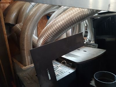 a machine that has a bunch of metal pipes on it
