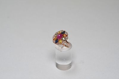 a close up of a ring on a white surface with a white background