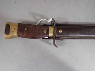 a knife that is laying on a table