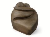 brown stone sculpture of a woman ' s head on a white background