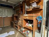 a van that has a bunch of items in it