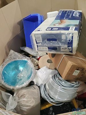 a cardboard box filled with many different types of items