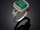 an emerald and diamond ring