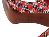 red, white, and blue patterned high heeled shoes with a bow