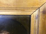 une photo d'un tableau représentant un homme barbu