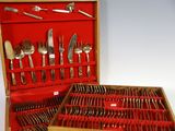a wooden box with a set of silverware in it