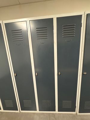 a row of lockers in a room with no doors