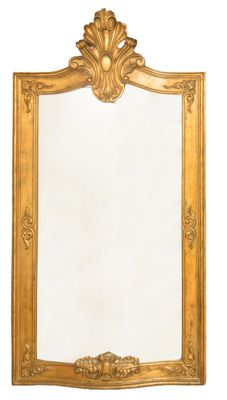 un miroir encadré d'or sur un mur blanc avec un fond blanc