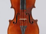 an old violin with a bow on a white background