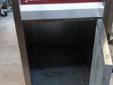 an image of a gas oven with a door open