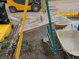 a wheelbarrow and a wheelbarrow in a parking lot
