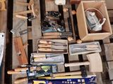 a lot of tools that are sitting on a pallet