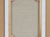 a close up of a picture frame hanging on a wall