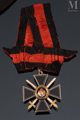 une image représentant une médaille ornée d'un ruban et d'une croix