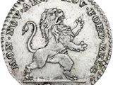 une vieille pièce d'argent sur laquelle est représenté un lion