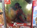 three video games on the table, one of which is a rogue and the other of which is a prince of persia