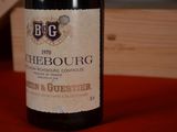 a bottle of wine that is sitting on a table
