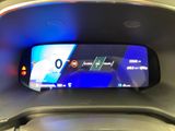 a digital display on the dashboard of a car